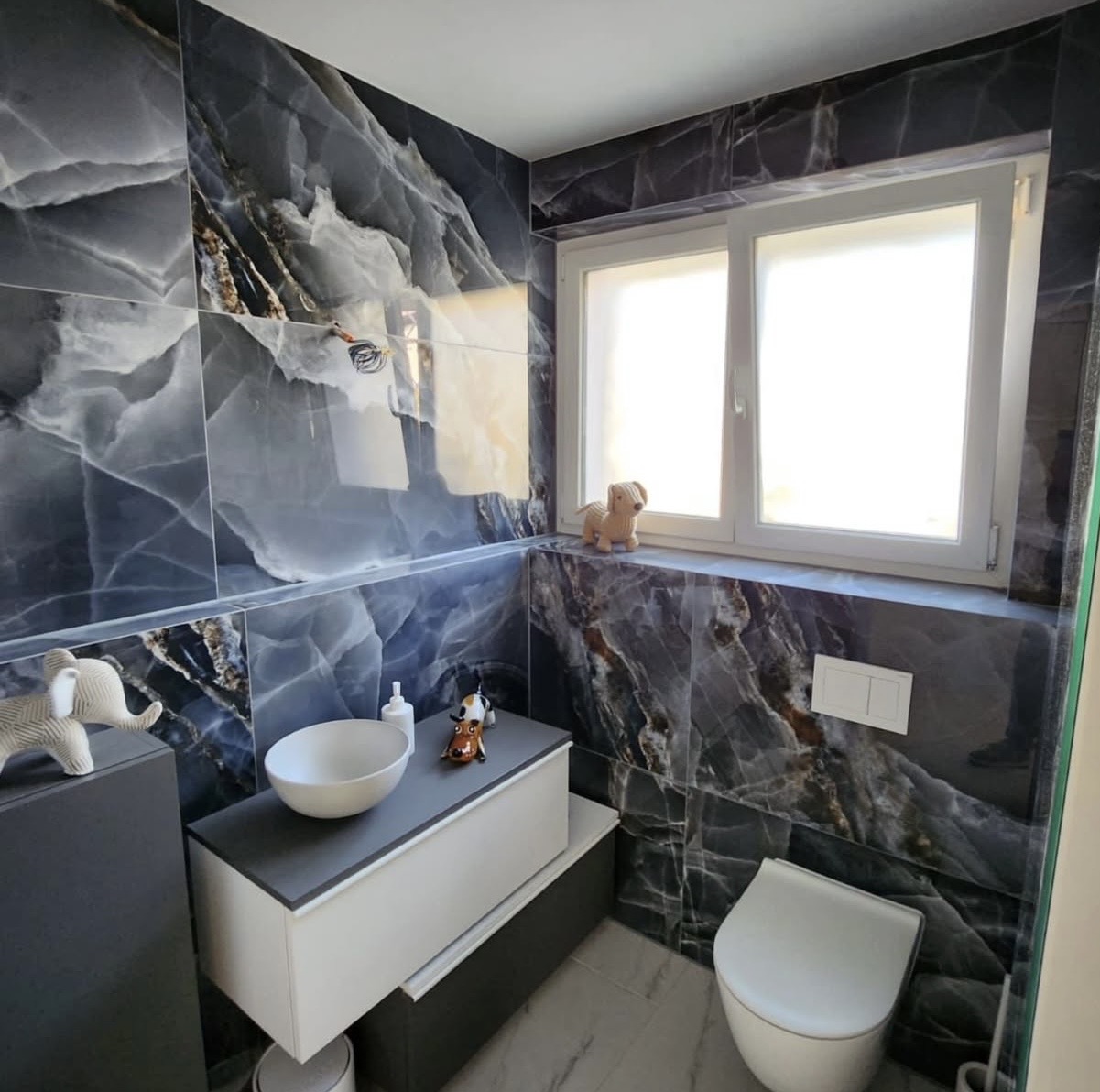 Rénovation salle de bains Mast — carrelage marbré